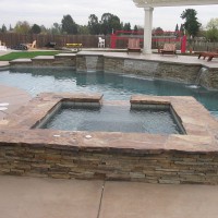 Raised Spa With Flagstone Cap Raised Spa With Flagstone Cap