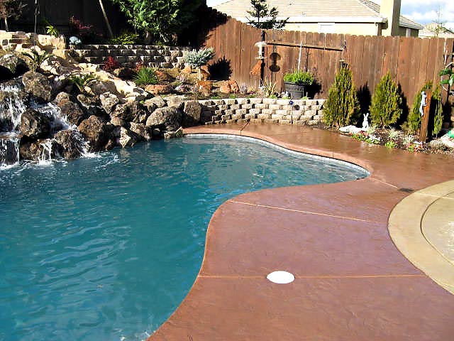 Colored stamped concrete pool deck in Folsom